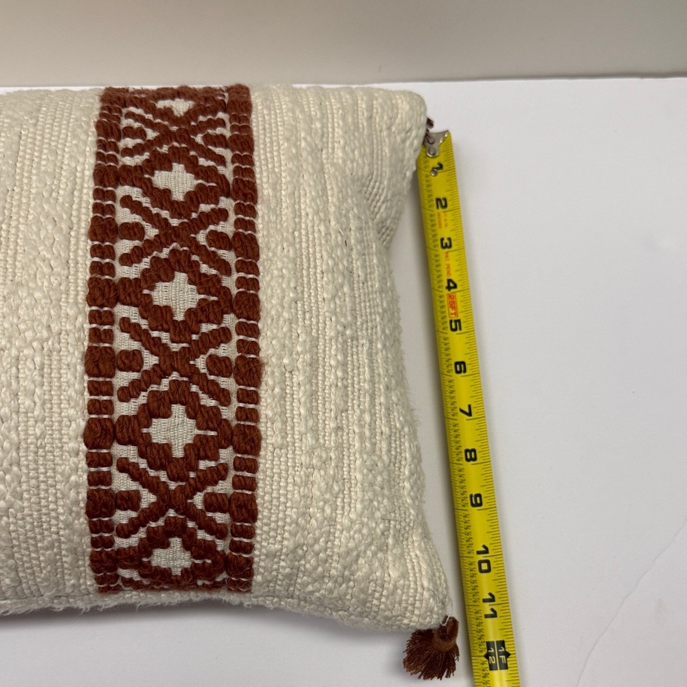 Textured Cream Throw Pillow with Rust Accent and Tassels - Picture 5 of 5